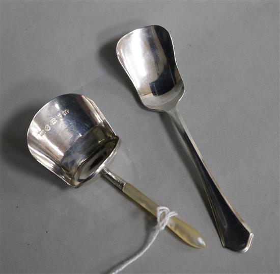A Georgian silver caddy spoon, Joseph Wilmore, Birmingham, 1810 and a later 1930s silver caddy spoon.